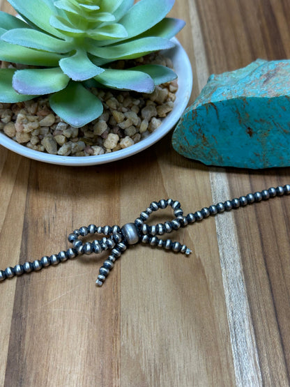 8" Single Strand Bow Bracelet
